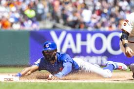 SAN FRANCISCO, CA - JULY 24: Chicago Cubs outfielder Jason Heyward (22) slides safely into third base during a game against the San Francisco Giants on July 24, 2019, at Oracle Park in San Francisco, CA. (Photo by Jay Anderson/Icon Sportswire)